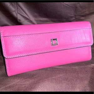Lodi’s bright pink multi pocket leather wallet